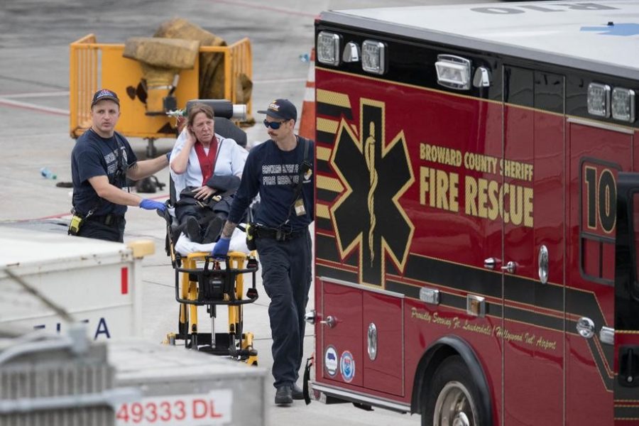 Broward County fire fighters helping wounded victim from the Fort Lauderdale attack. 