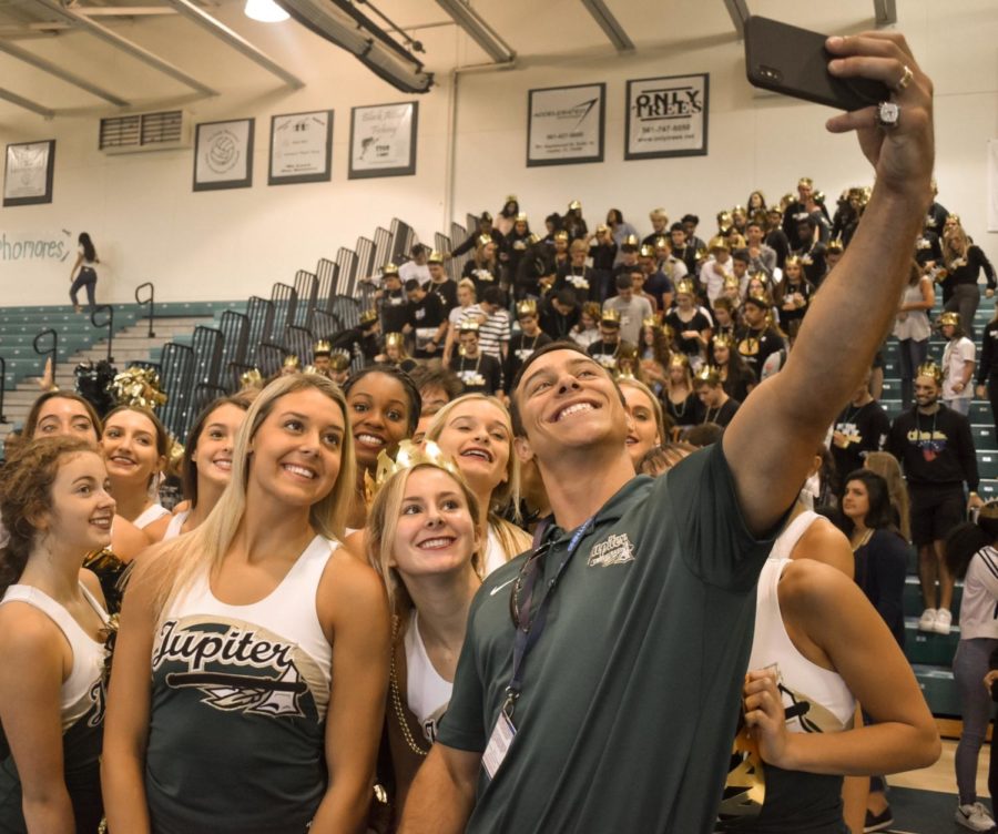 The cheer team taking a selfie after the pep rally 