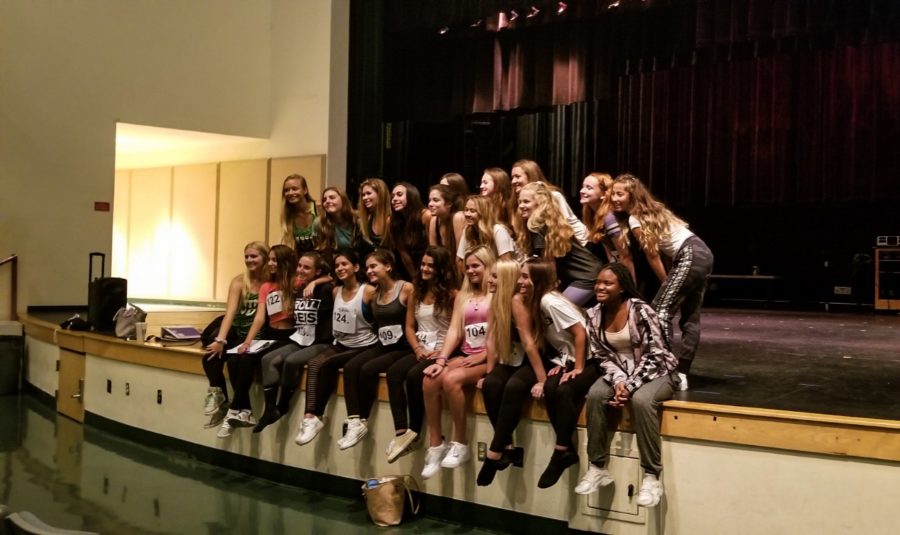 2019-2020 Warrior Dance Team members smiling to take a picture after auditions