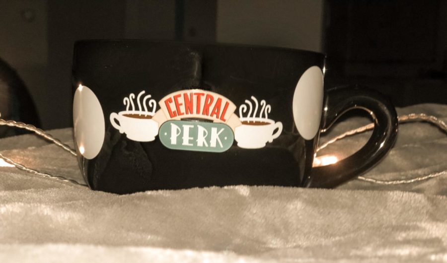 A mug displaying the fictional coffee shop Central Perk, where a lot of Friends took place
