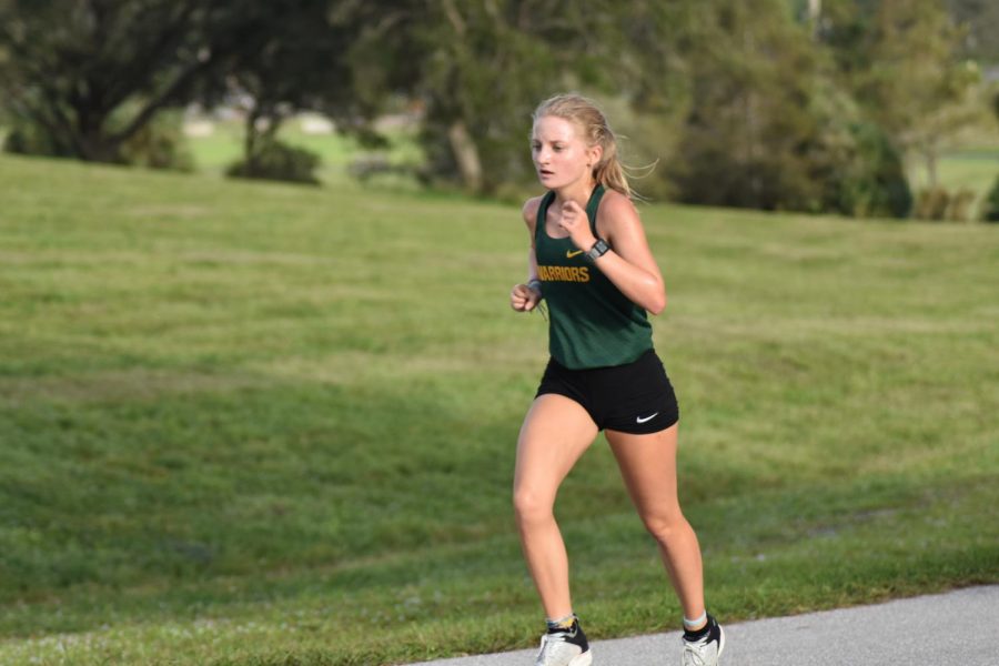 Senior Sydney Buck competing in a cross country meet.