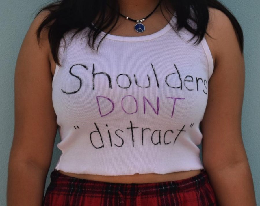 A JHS student wears a shirt on Sept. 3 with a message about dress code policies.