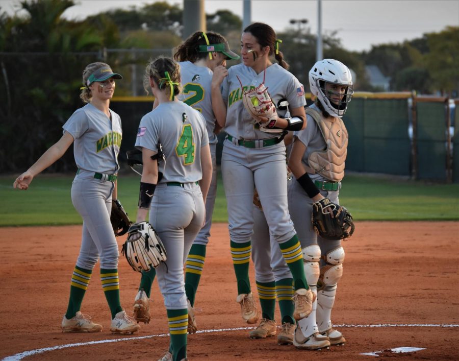 Jupiter High lady warriors moments before the first pitch of the season.
