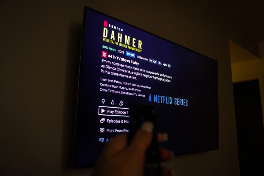 The+Dahmer+series+on+Netflix+is+played+on+screen.