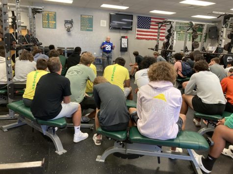 Photo provided by Josephine Buscemi 
 of Robert Duhon talking about his experiences in the NFL to the Jupiter High football team