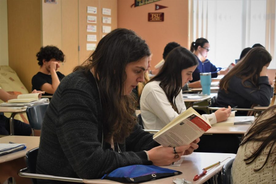Students captured reading a book for their AP Literature class.