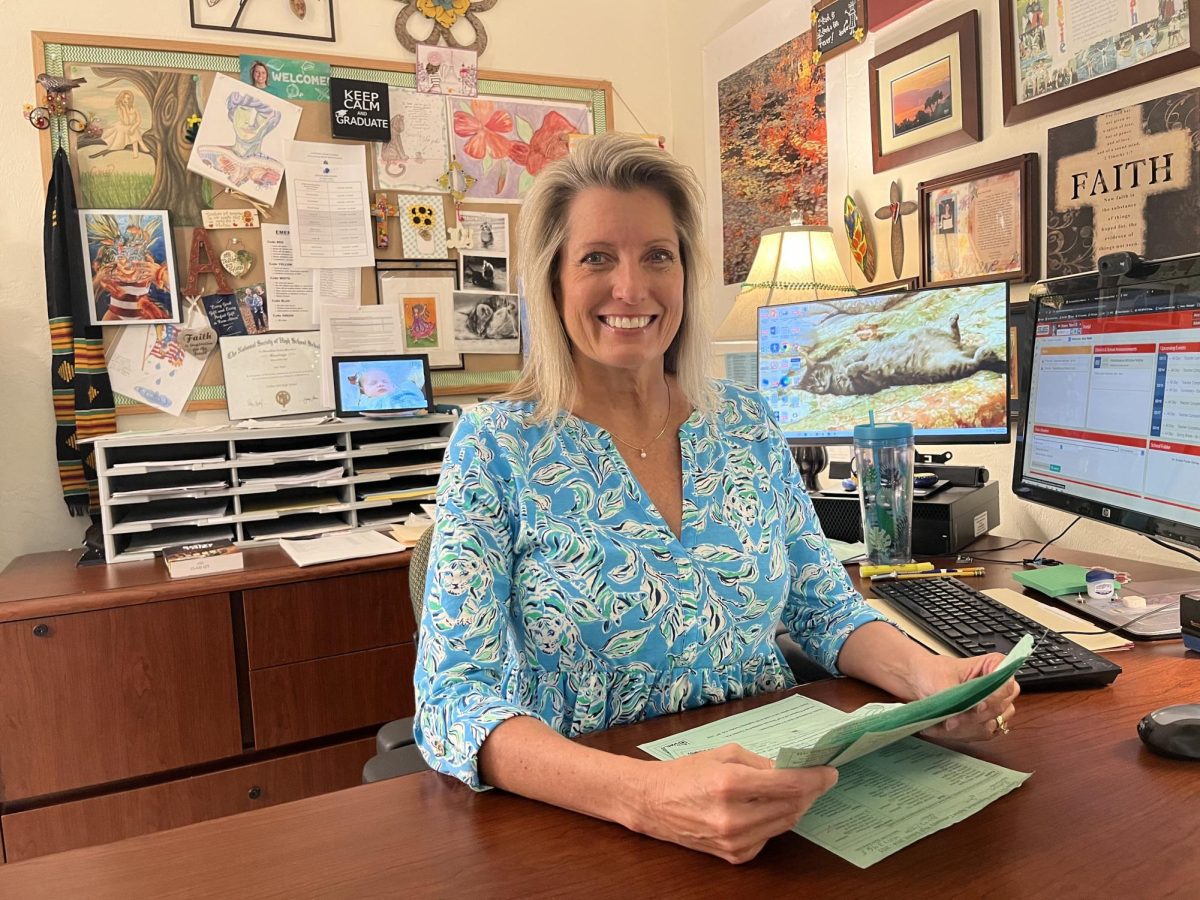 Amy Hand smiling in her office