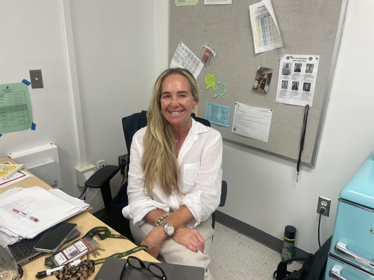 Ms. Kelly in her classroom, preparing for class