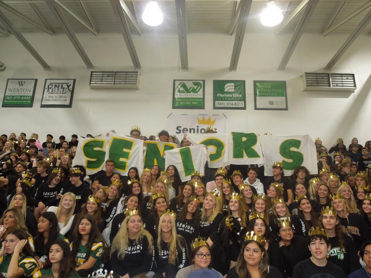 Seniors in the senior section during the homecoming pep rally 