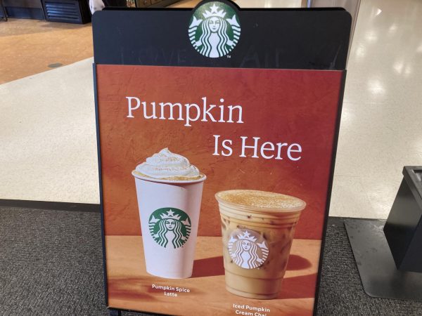 Starbucks' popular pumpkin spice drinks on a sign